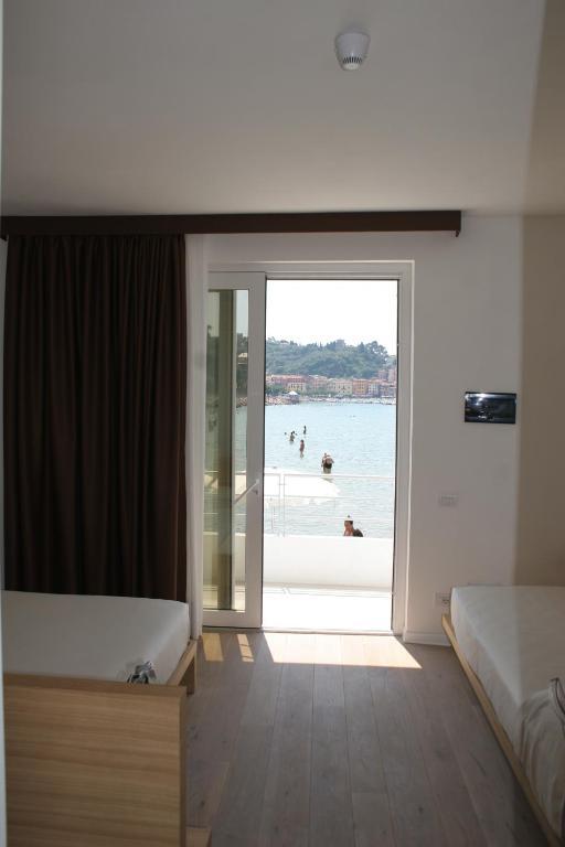Piccolo Hotel Del Lido Леричи Номер фото